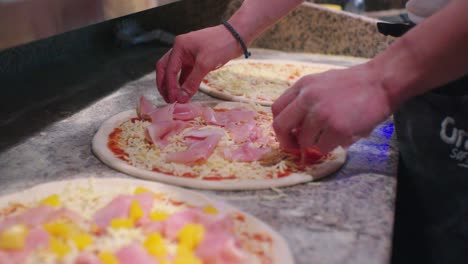 Fresh-ham-is-added-to-the-pizza