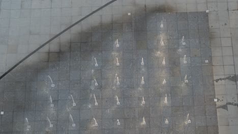 City-fountain-in-Kaunas,-Lithuania.-Drone-aerial-view
