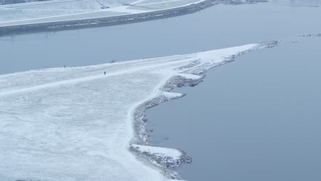 Aerial-view-Of-Nemunas-And-Neris-Confluence,-in-winter-time