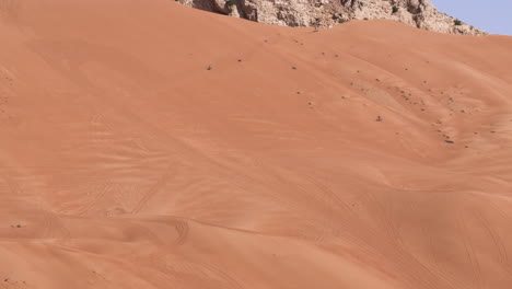 Extreme-Off-Roading-Experience-At-Red-Desert-Sand-Dunes-At-Fossil-Rock-In-Sharjah,-United-Arab-Emirates---Wide-Shot