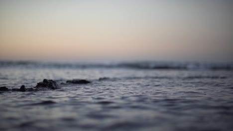 Slow-motion-shallow-depth-of-field-shot-of-ripples-in-the-ocean