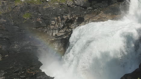 lush-and-powerful-Gaustafallet-waterfall-in-river-Gauste,-northern-Sweden,-during-summer-season