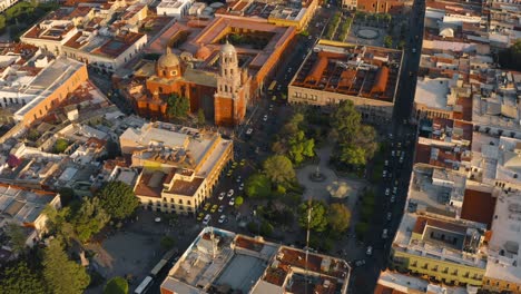 Aerial-view-of-downtown-Queretaro,-4k-cinematic-sunset