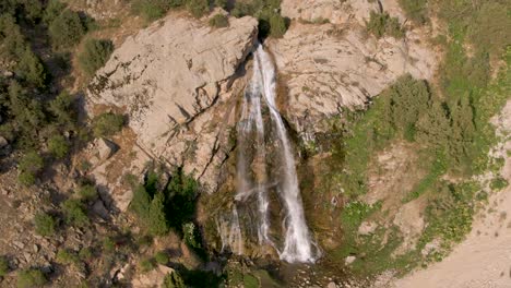 Majestic-Suvtushar-waterfall-Cascading-Down-On-Steep-Cliff-In-Uzbekistan