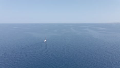 Far-Away-Sailboat-on-the-Mediterranean,-Italy-in-4K-Format:-MP4-|-4K-50p-|-8-bit-|-D-Cinelike-|-Ungraded