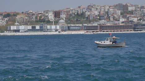 a-boat-crosses-the-sea-on-the-golden-horn-in-istanbul-in-Turkey