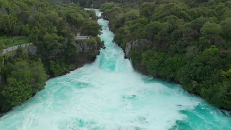 Aerial-drone-ascending-shot-of-Hukas-Falls,-New-Zealand