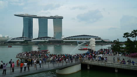 Singapore---Circa-Time-lapse-in-front-of-the-Marina-Bay-Sands-building-in-Singapore-with-a-large-crowd-of-tourists