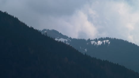 Mountains-near-the-Tegernsee-with-a-little-bit-snow-left-on-top-during-springtime