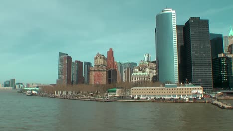 Arriving-to-Lower-Manhattan,-New-York-City-with-the-Staten-Island-Ferry-on-a-sunny-day-in-April,-2010