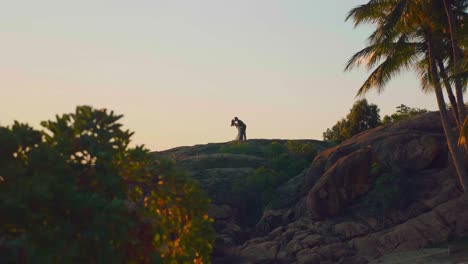 marriage-couple-kissing-and-hugging-each-other-on-the-hills