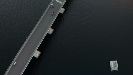 Aerial-shot-over-Tasman-bridge-highway-crossroad-at-sunset