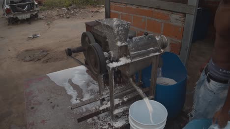 Extracting-cocnut-oil-using-a-machine-on-the-Island-of-Trinidad-and-Tobago