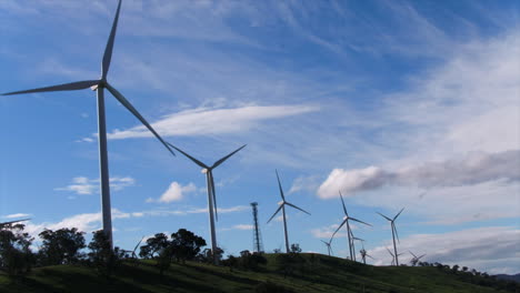 Aerial-of-Wind-Turbine-Farm-in-rural-Australia,-camera-tilting-up