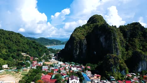 Aerial-view-of-Taraw-cliff-and-El-Nido-Town,-Palawan,-Philippines