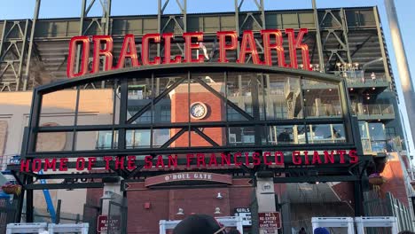 The-San-Francisco-Giants-flag-waving-in-the-background-on-the-O'Doul-entrance-side-of-the-baseball-stadium