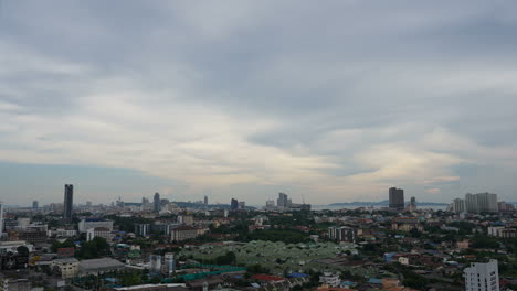Pattaya-Thailand---Circa-Time-lapse-top-view-of-the-city-of-Pattaya-showing-the-busy-moving-traffic-and-skyscrapers-in-the-background