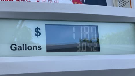 Customer-fueling-up-his-car-at-a-Shell-gas-station-right-before-the-Fourth-of-July-travel-madness-at-$3