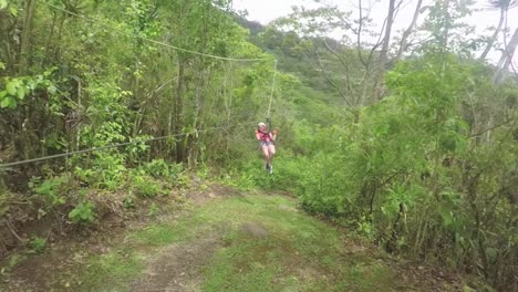 Girl-Finishes-Her-Zip-Line-Trajectory-While-Smiling