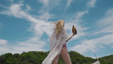 Model-having-a-pinacolada-during-boat-trip-in-Buzios---Rio-De-Janeiro---Brazil