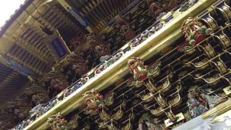 Closeup-from-the-rich-decorated-colorful-roof-of-the-Toshogu-Shrine-temple-in-Nikko,-Japan