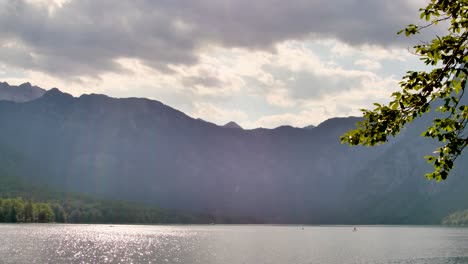 Timelapse-of-Bohinj-lake-full-of-water-activity-on-a-sunny-but-cloudy-and-warm-day