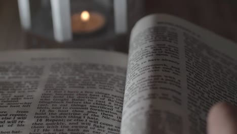 Reading-the-Bible-by-candlelight