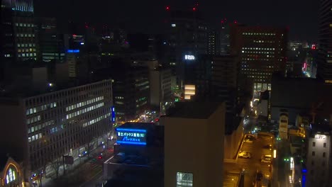 Overhead-shot-of-skyline-featuring-skyscrapers-and-traffic