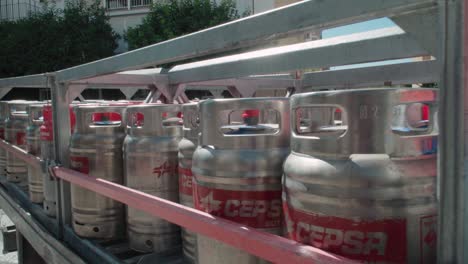 Detail-of-Cepsa-butane-gas-cylinders-in-back-of-truck-in-Seville,-Spain