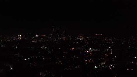 Aerial-rising-shot-of-illegal-fireworks-going-off-over-Hollywood-on-4th-of-July-2020