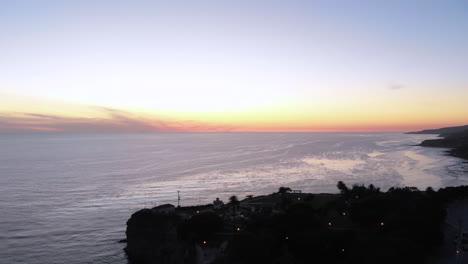 Epic-drone-shot-approaching-beautiful-San-Pedro,-CA-cliffs-during-golden-hour