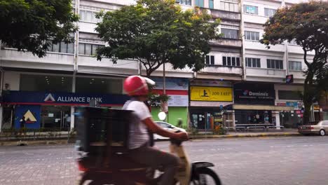 Conducción-De-Automóviles-Y-Motocicletas-En-La-Concurrida-Intersección-De-Tráfico-En-Kuala-Lumpur,-Estático