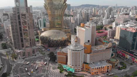 Tilt-reveal-aerial-of-Macau-skyline-with-famous-Grand-Lisboa-Hotel