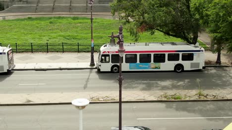 SEPTA-Public-Transit-bus-parked-along-busy-street-in-Philly