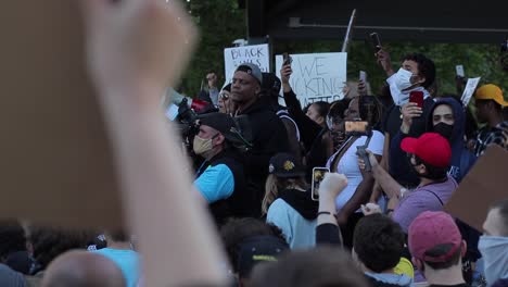 Organizer-with-megaphone-speaks-at-large-BLM-demonstration-in-MI
