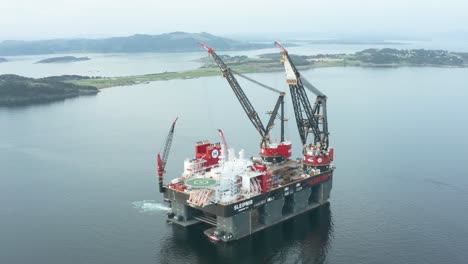Aerial-View-of-SSCV-Hareema-Sleipnir,-Heavy-Lifting-Crane-Platform-Vessel-in-Sea