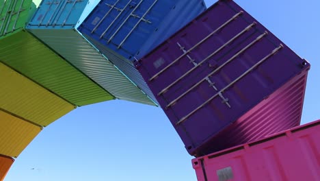 Rainbow-Sea-Container-Fremantle,-close-up-view-under-the-colorful-arch
