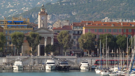 Luxury-Yachts-in-Nice-Harbor,-Mountain-background