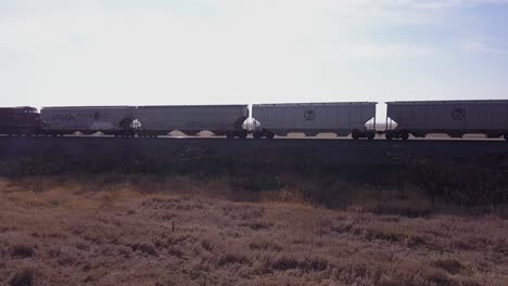 Static-shot-as-Canadian-Pacific-train-passes-through-frame-R-to-L