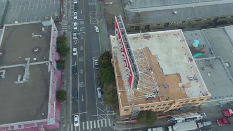 San-Francisco-historic-Coca-Cola-sign-with-drone-pan-to-skyline