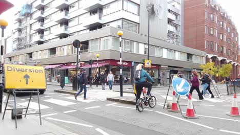 Fire-Brigade-on-emergency-call-man-on-bike-stops