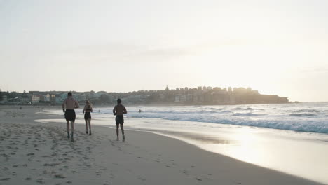 Fitness-enthusiasts-endurance-running-on-Bondi-beach-Sydney
