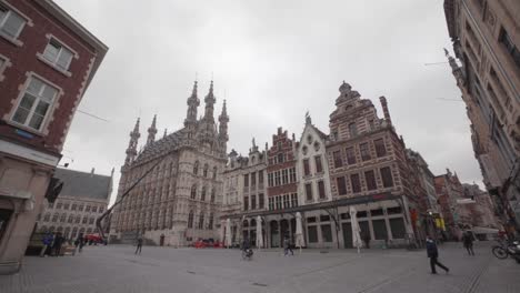Wide-angle-of-guild-houses-and-the-town-hall-on-the-Grand-Square-in-Leuven,-Belgium