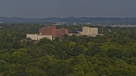 Birmingham-Alabama-Aerial-v14-panoramic-view-of-buildings-surrounded-by-dense-trees-in-Druid-Hills-neighborhood-with-Central-City-revealed---Shot-on-DJI-Inspire-2,-X7,-6k---August-2020
