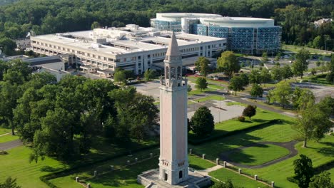 Aerial-orbit-of-clock-tower-at-Nemours-AI-duPont-Childrens-Hospital-in-Wilmington-Delaware,-funded-by-nonprofit-trust