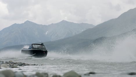 Speedboats-Moving-Fast-on-Glacial-River-in-a-Wilderness-of-Alaskan-Outback,-Slow-Motion