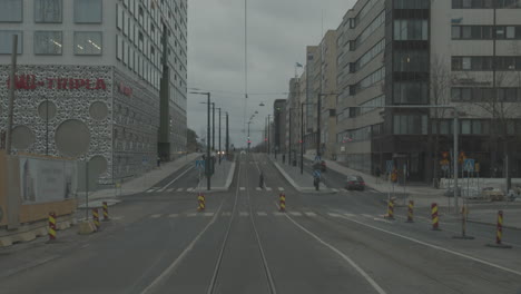 View-through-the-rear-window-of-a-moving-tram-in-Helsinki-city-center