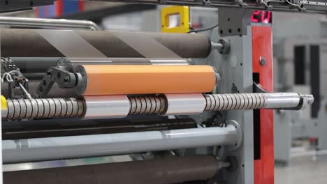 industrial-safety-first-concept,-Large-format-printing-machine-in-operation,-Industry
