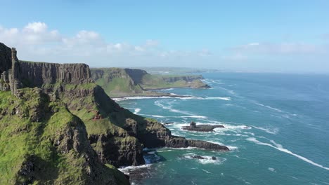 The-Giants-Causeway-lies-at-the-foot-of-the-basalt-cliffs-along-the-sea-coast-on-the-north-shores-of-County-Antrim