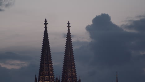 The-upper-top-of-cologne-cathedral-with-nice,-passing-clouds-in-the-background